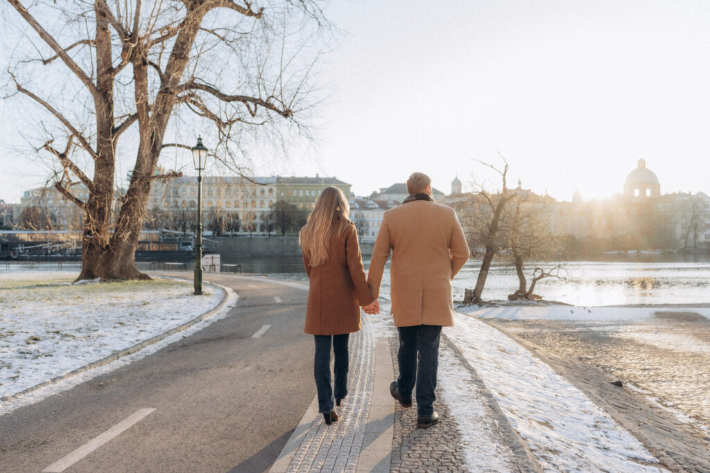 Winter couple walking photography in prague