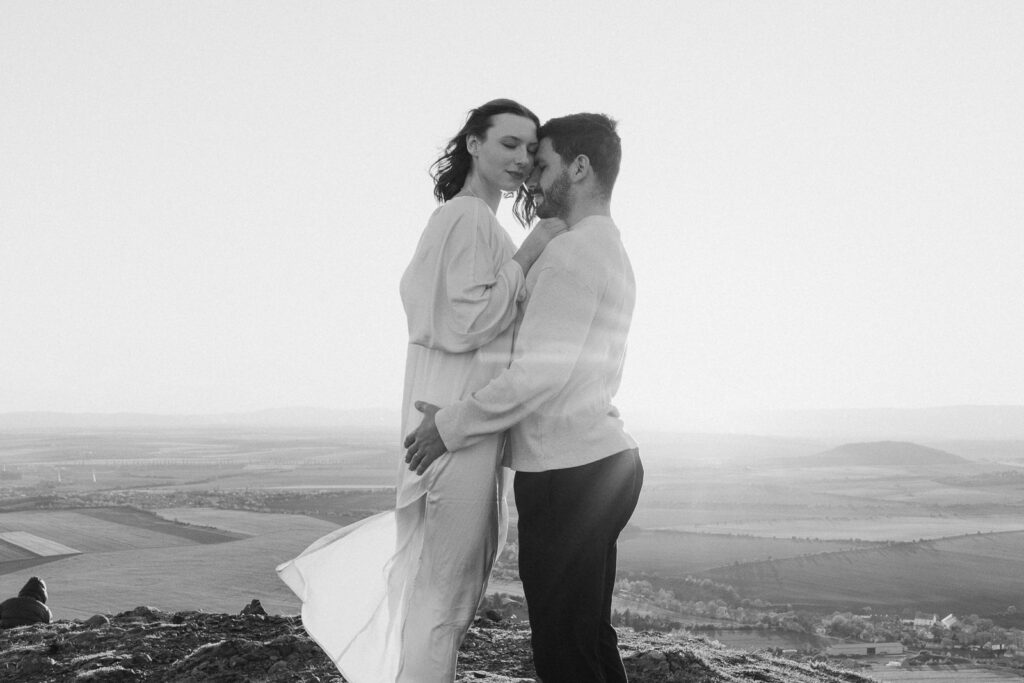 Romantic couple photoshoot in nature near Prague at sunset