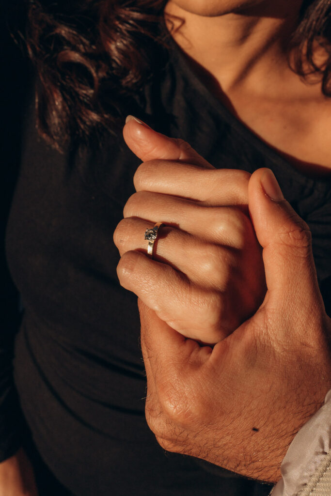 Golden hour engagement photos by the Vltava river in Prague