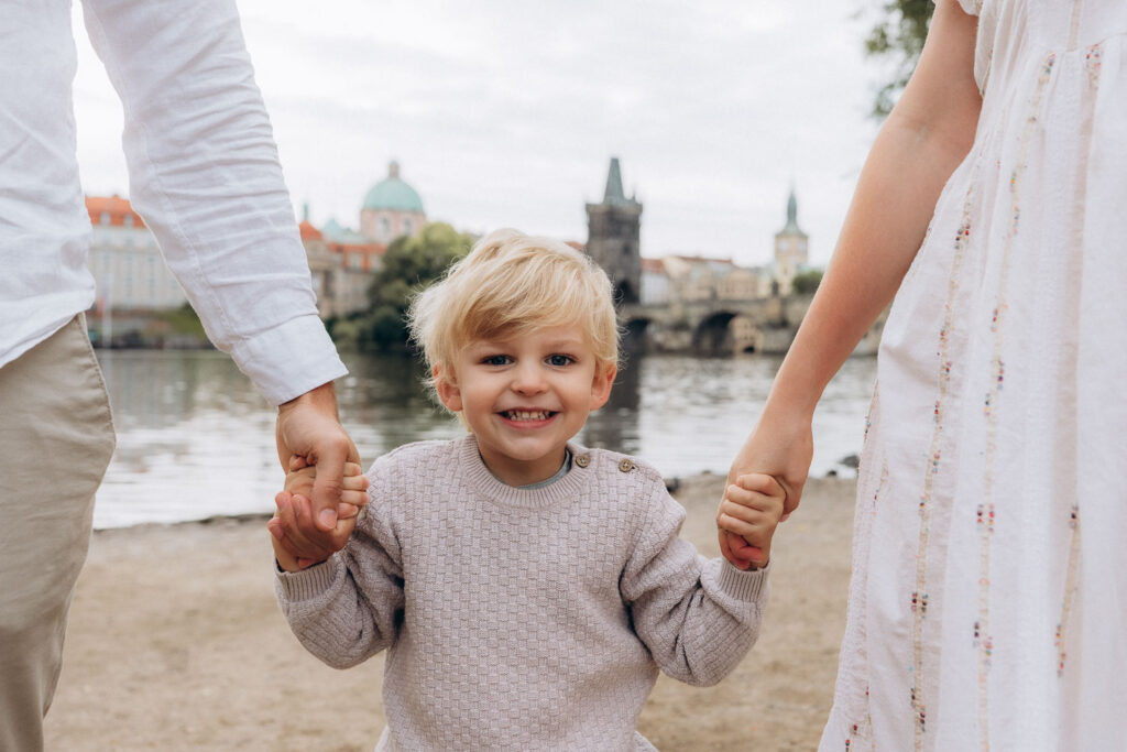 Cozy family photoshoot near Charles Bridge, Prague