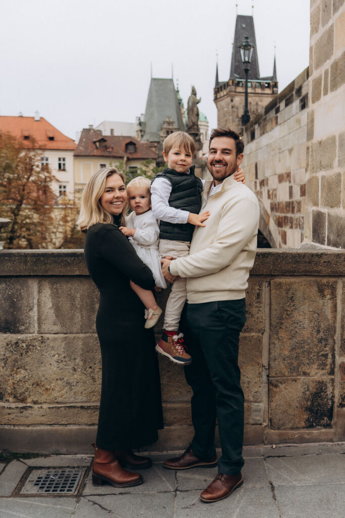 Family portrait session on Charles Bridge in Prague