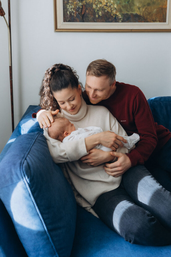 Newborn baby portrait with soft natural light in family home in Prague