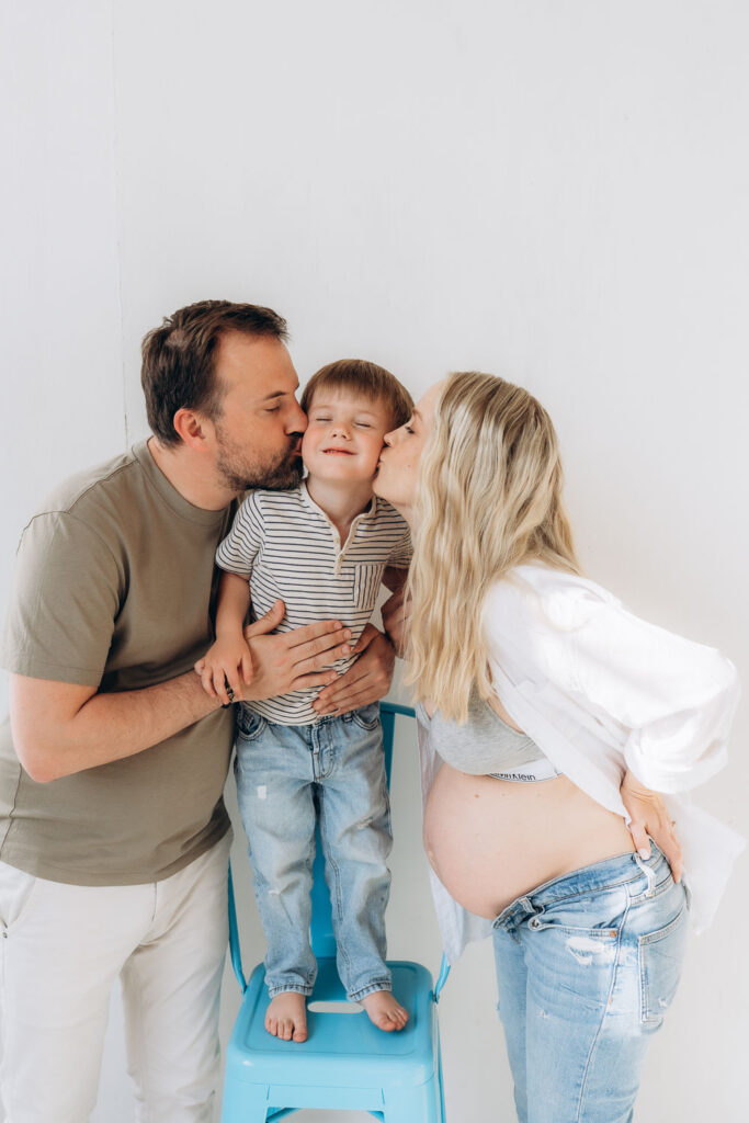 Pregnancy family photoshoot with toddler boy in Prague photography studio