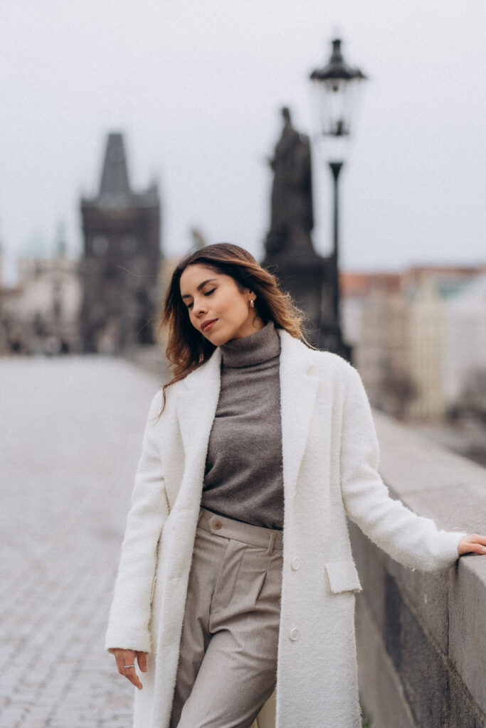 Casual female portrait photoshoot on Charles Bridge, Prague