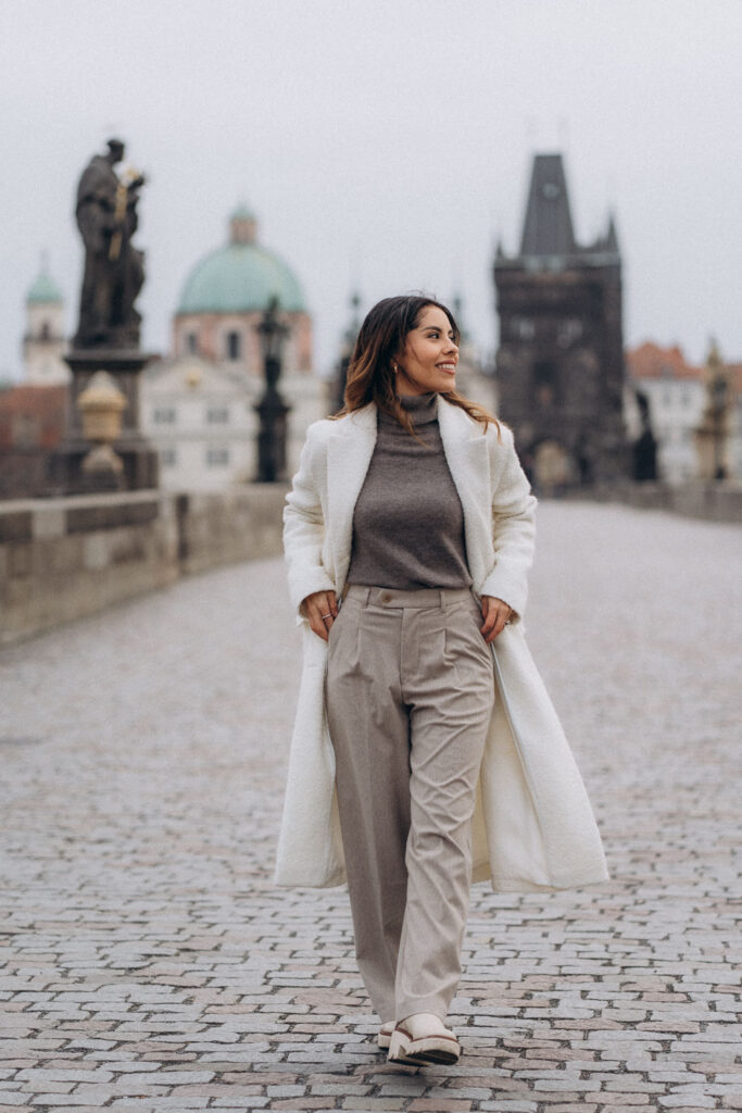 Outdoor female portrait session on Charles Bridge, Prague
