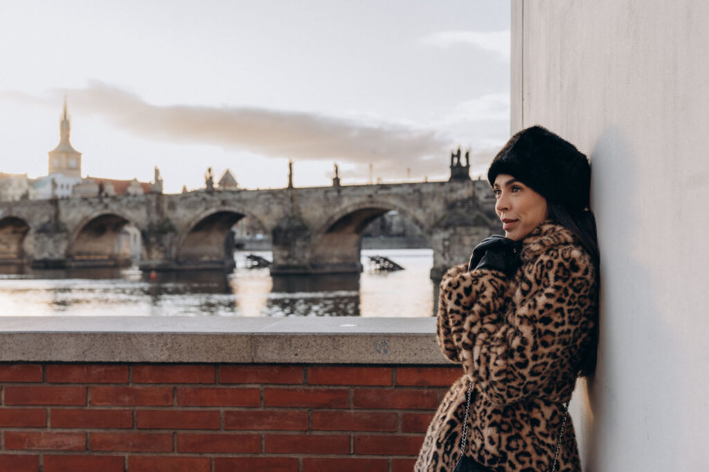 Portrait session captured in sunrise light in Prague centre near Charles Bridge