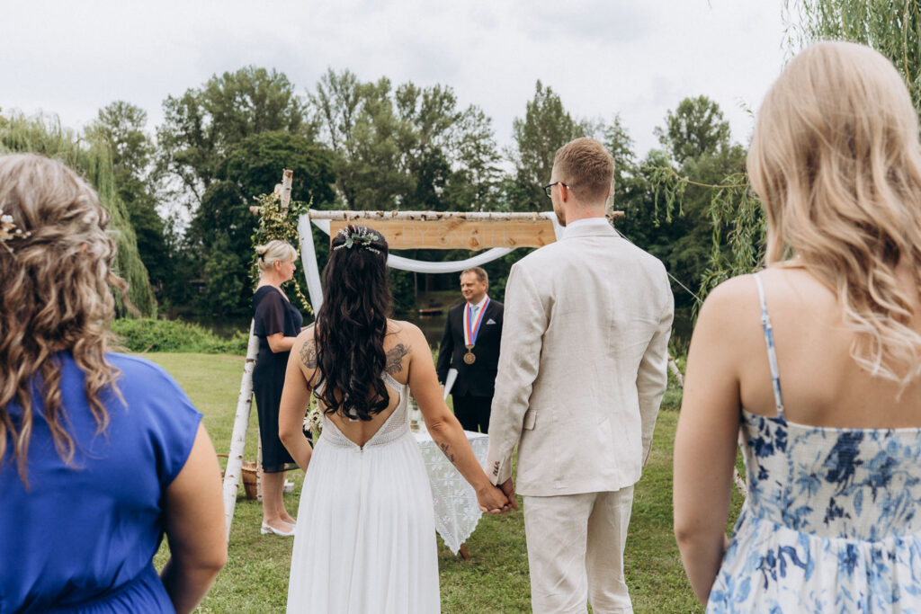 Bride and groom enjoying outdoor wedding near Prague