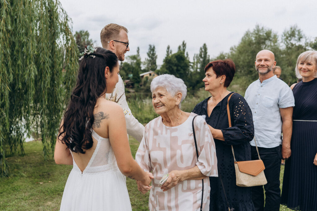 wedding guests at outdoor wedding near Prague