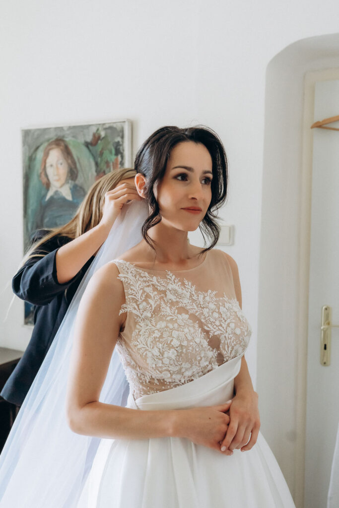 bride getting ready at wedding venue near prague