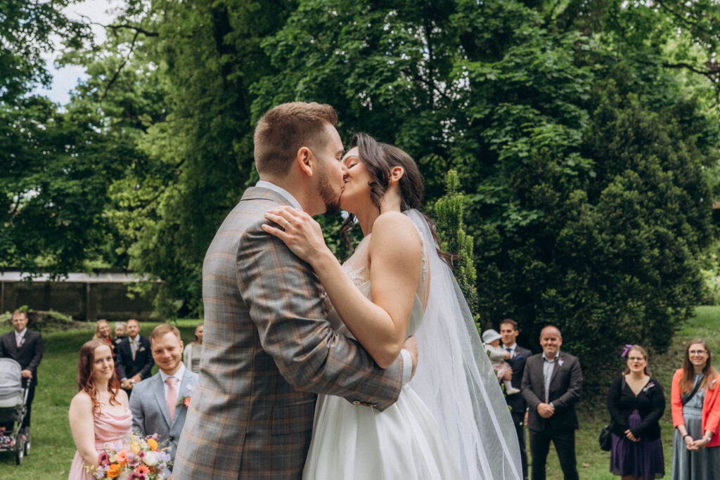 Romantic outdoor wedding ceremony in château park close to Prague
