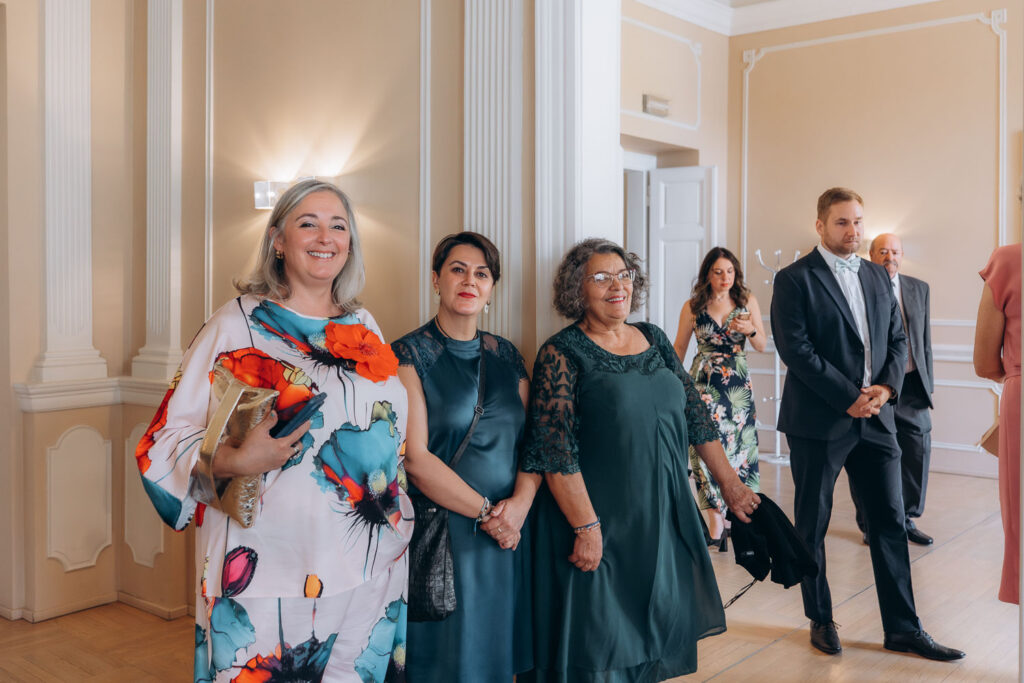 Wedding guests before ceremony at Prague City Hall