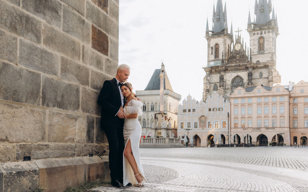 Bride and groom sharing moment during sunrise wedding session in Old Town Square