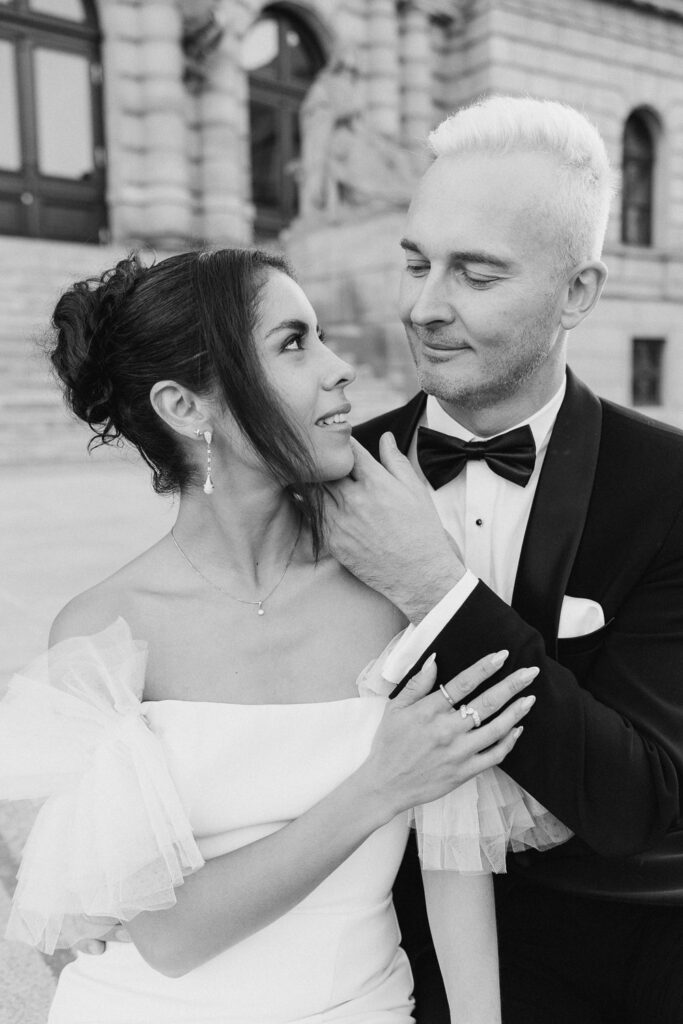 Wedding portraits of bride and groom at Rudolfinum in Prague