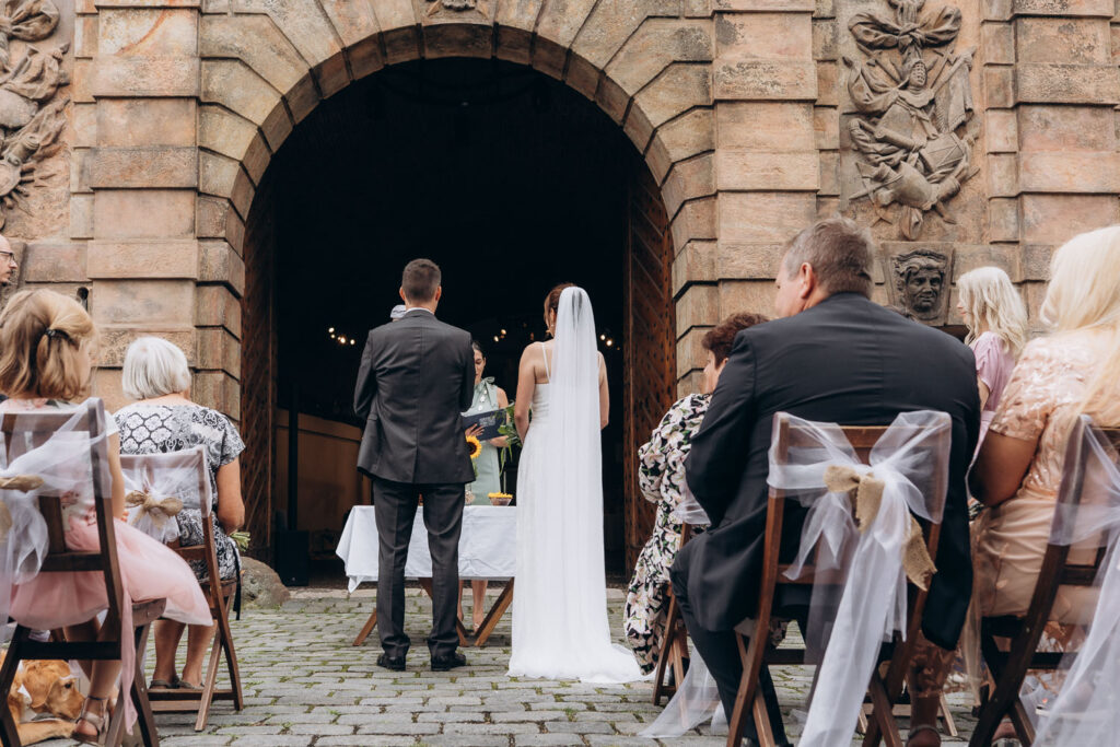 Wedding ceremony held outdoors in Prague in summer
