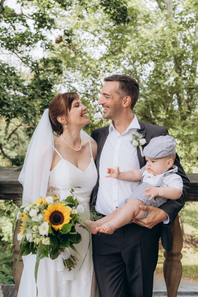 Wedding couple enjoying outdoor summer wedding in Prague
