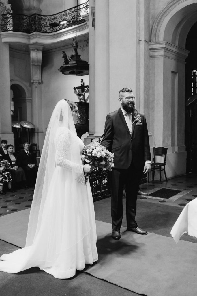 Romantic autumn church wedding in Prague Old Town Square