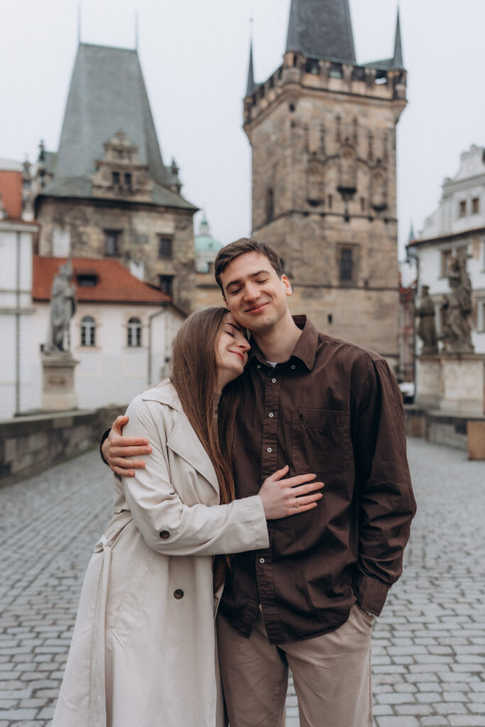 Natural couple photography Prague Charles Bridge candid style